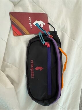 cotopaxi Black Belt Bag with Purple, Turquoise, Orange, Pink Accents